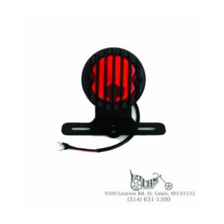 Black round tail lamp with plastic grill and red lens 12 volt bulb type