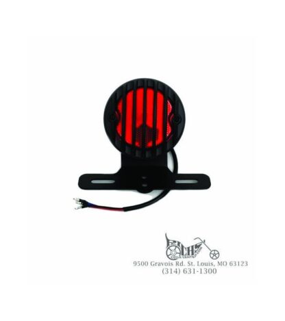 Black round tail lamp with plastic grill and red lens 12 volt bulb type